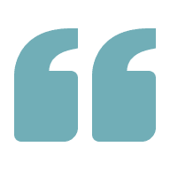 A large blue quotation mark symbol on a white background.